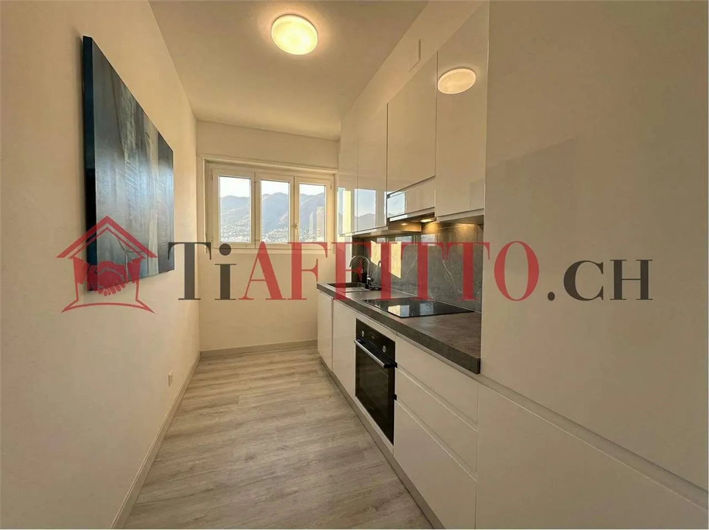 BRIGHT 2.5-ROOM APARTMENT WITH BALCONY ON THE 6TH FLOOR IN CHIASSO CITY - Photo 5 of 6