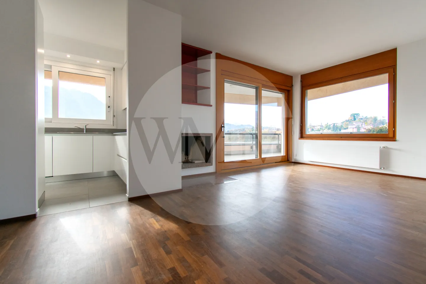 PENTHOUSE 3.5 ROOMS RENOVATED WITH FIREPLACE AND LAKE VIEW - Photo 1 of 19