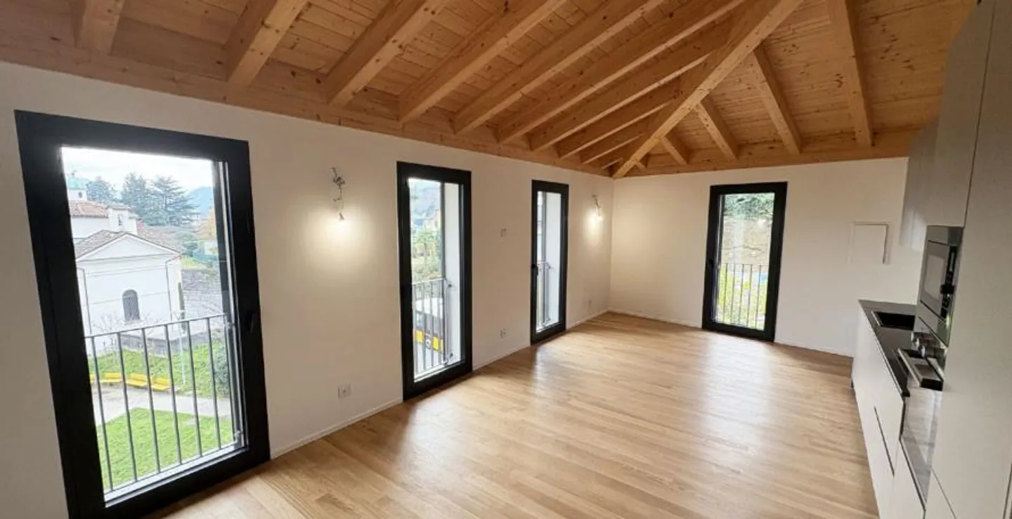 Exclusive Attic with Lake View in Pura – Modern Comfort in Position... - Photo 1 of 4