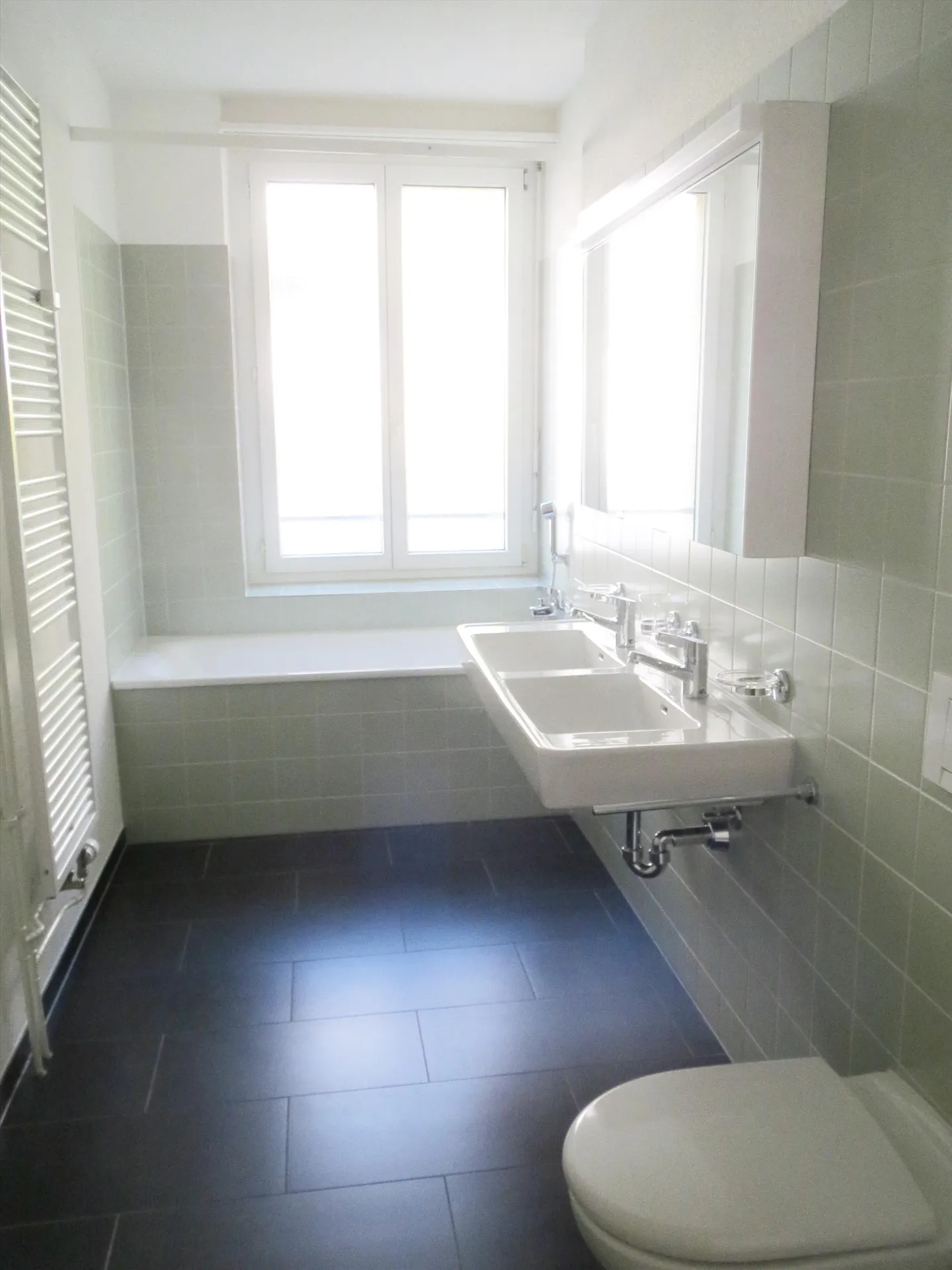 RENT WITHOUT DEPOSIT - Modern Living near the Train Station - Photo 2 of 3