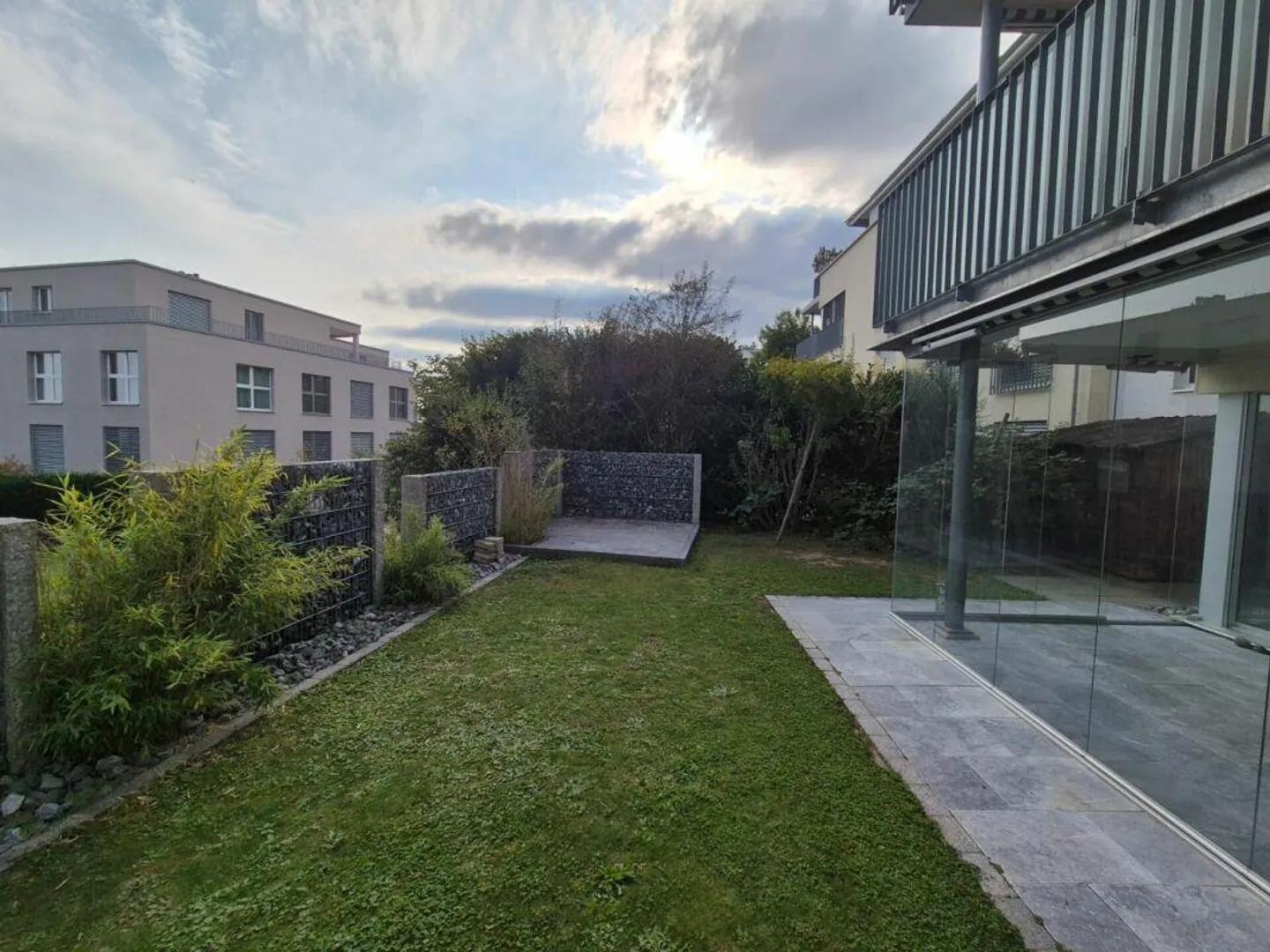 Fabelhafte 5.5 Zimmer Wohnung mit Garten - Foto 1 von 12