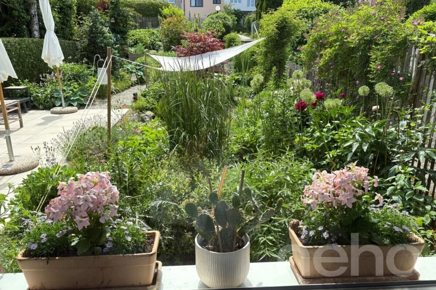 Renovated Corner Townhouse with Beautiful Garden - Photo 1 of 12