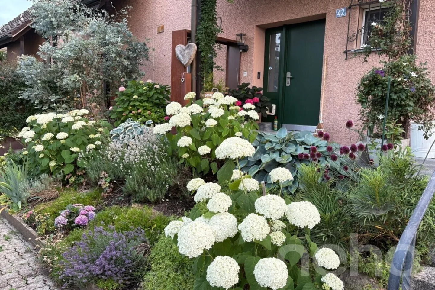Renovated Corner Townhouse with Beautiful Garden - Photo 2 of 12