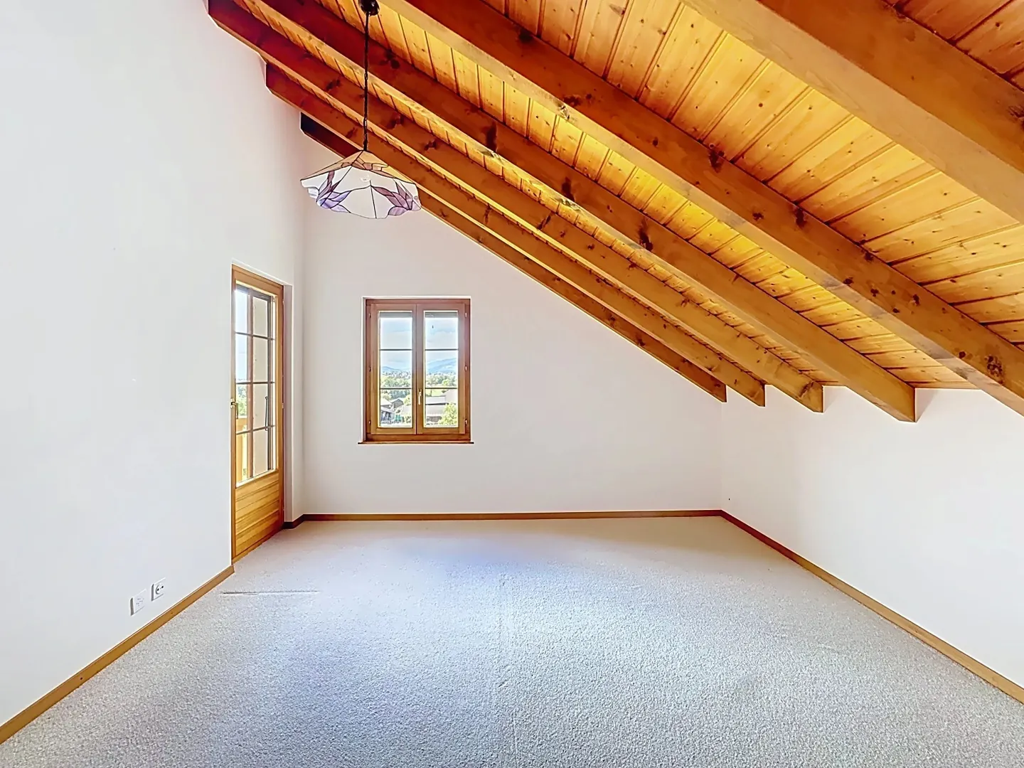 Appartement spacieux avec grenier - Photo 10 sur 11