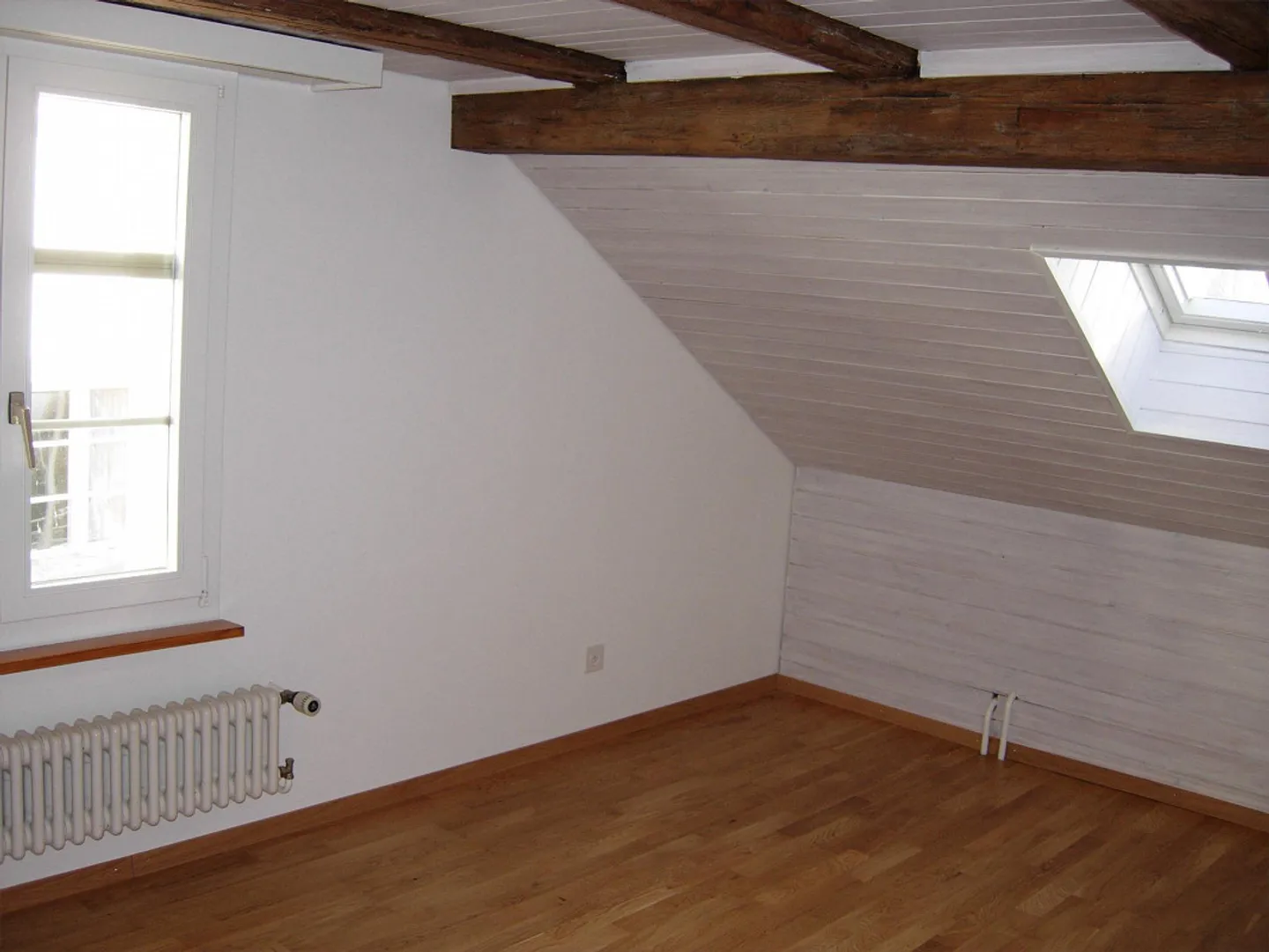 Appartement sous les combles de 3,5 pièces - Photo 2 sur 9