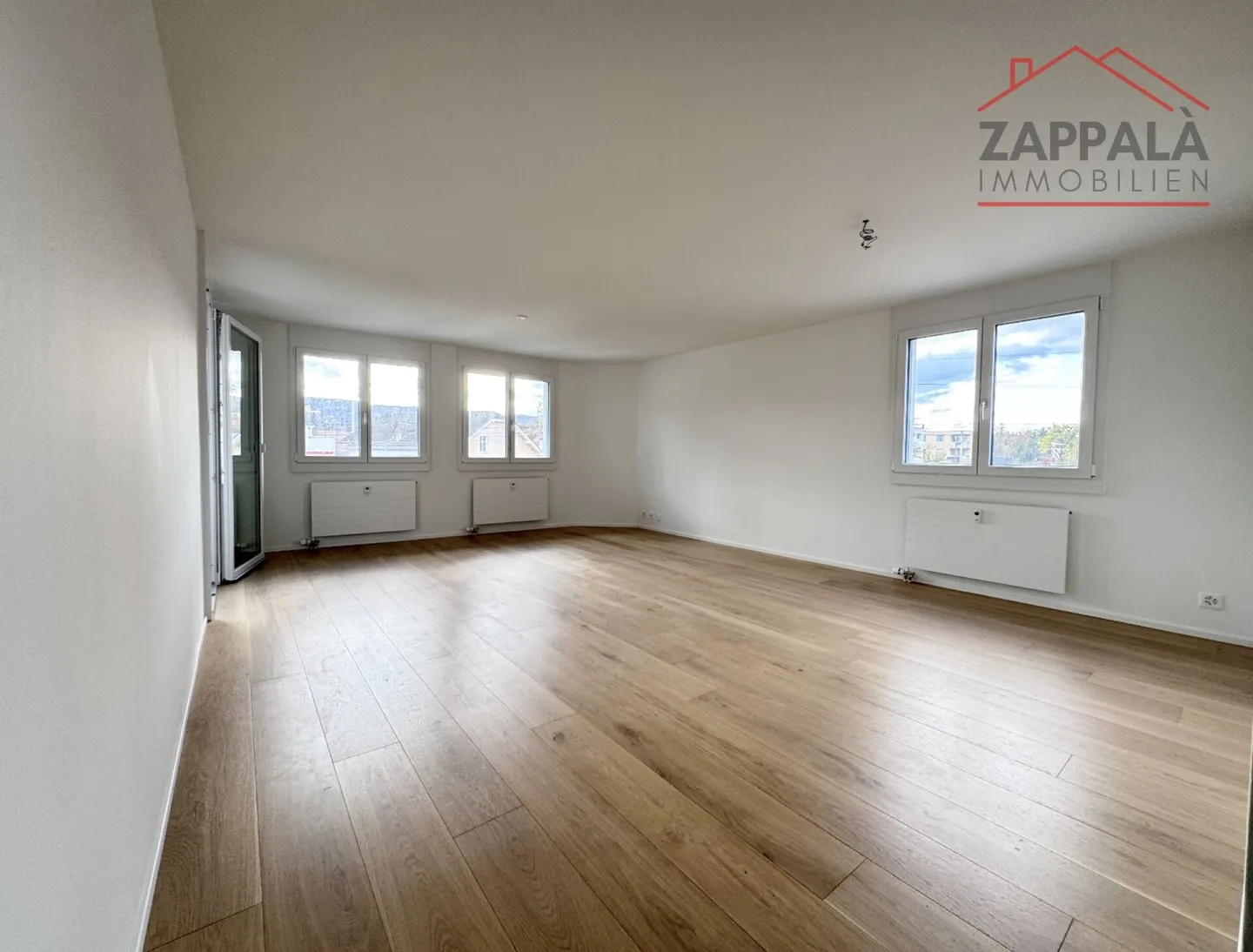 Modern Living with Style and Tranquility - Your New Dream Apartment in Reinach - Photo 1 of 14