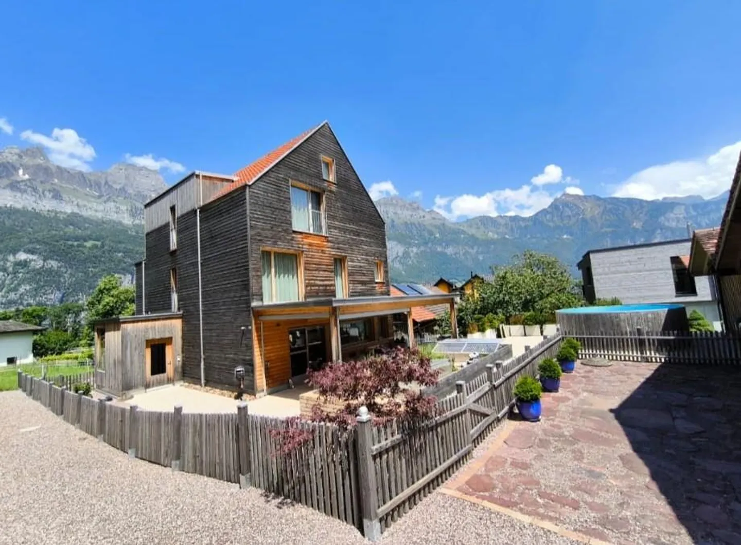 Maison en bois moderne, indépendante, de 6 1/2 pièces avec vue sur le lac/proche du rivage - Photo 1 sur 30