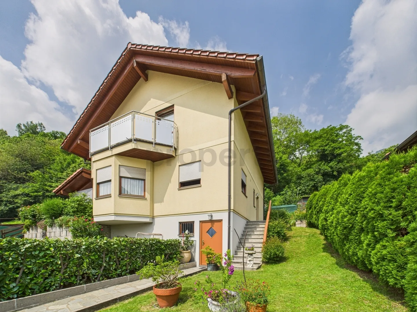 Wunderschönes Einfamilienhaus mit 4,5 Zimmern und Garten in Sigirino - Foto 1 von 12