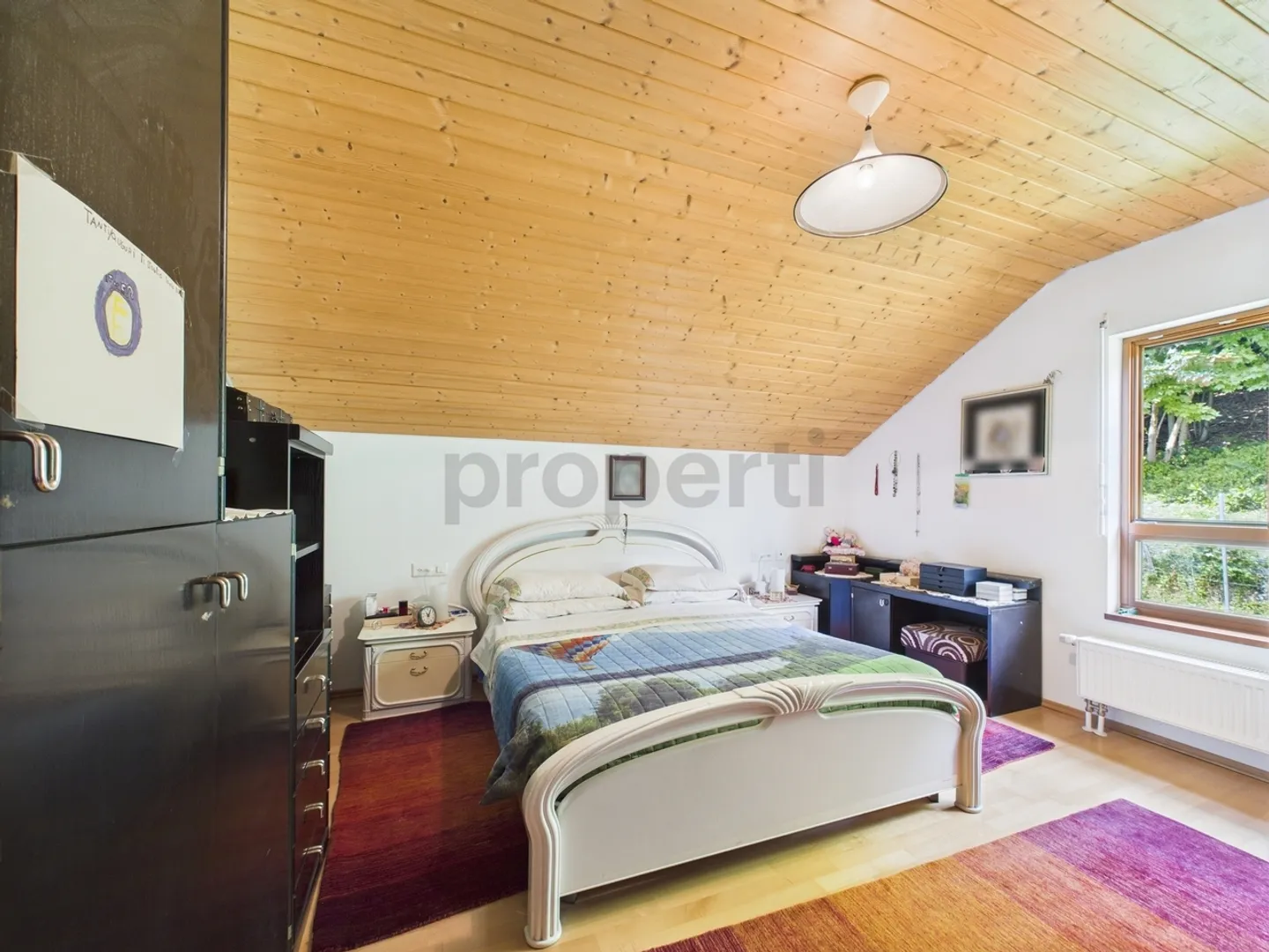 Wunderschönes Einfamilienhaus mit 4,5 Zimmern und Garten in Sigirino - Foto 7 von 12