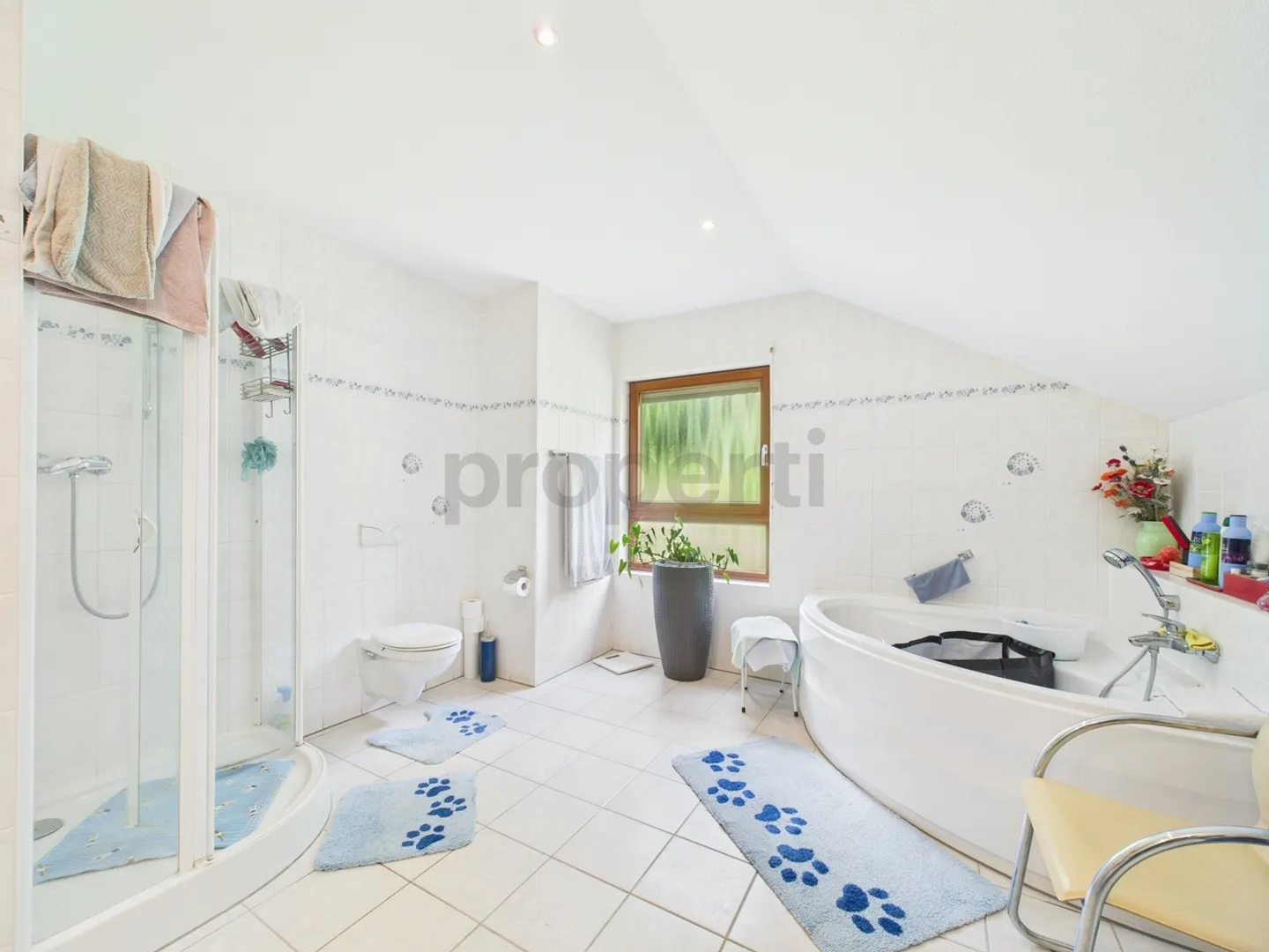 Wunderschönes Einfamilienhaus mit 4,5 Zimmern und Garten in Sigirino - Foto 10 von 12