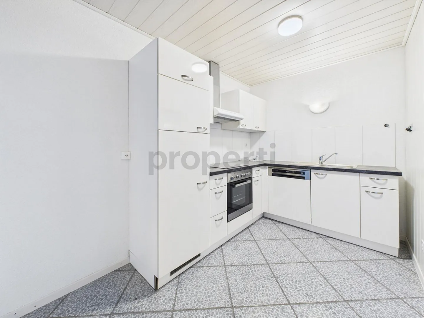 Appartement 2,5 pièces avec jardin et tout le confort - Photo 4 sur 8