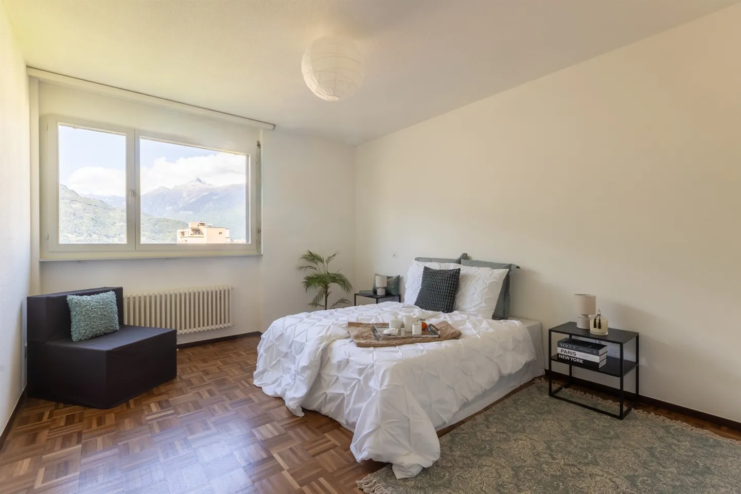 Spacious penthouse with fireplace and panoramic terrace in Giubiasco - Photo 8 of 13