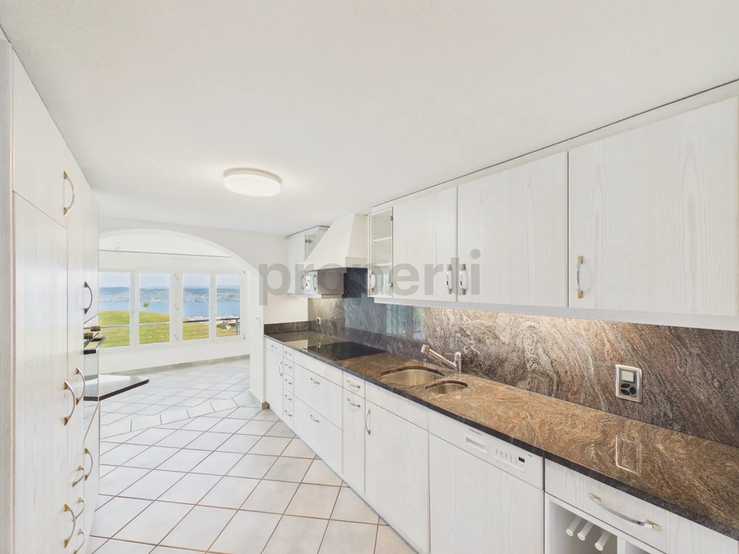 Hoch über dem Zürichsee mit unverbaubarem Seeblick - Foto 4 von 13
