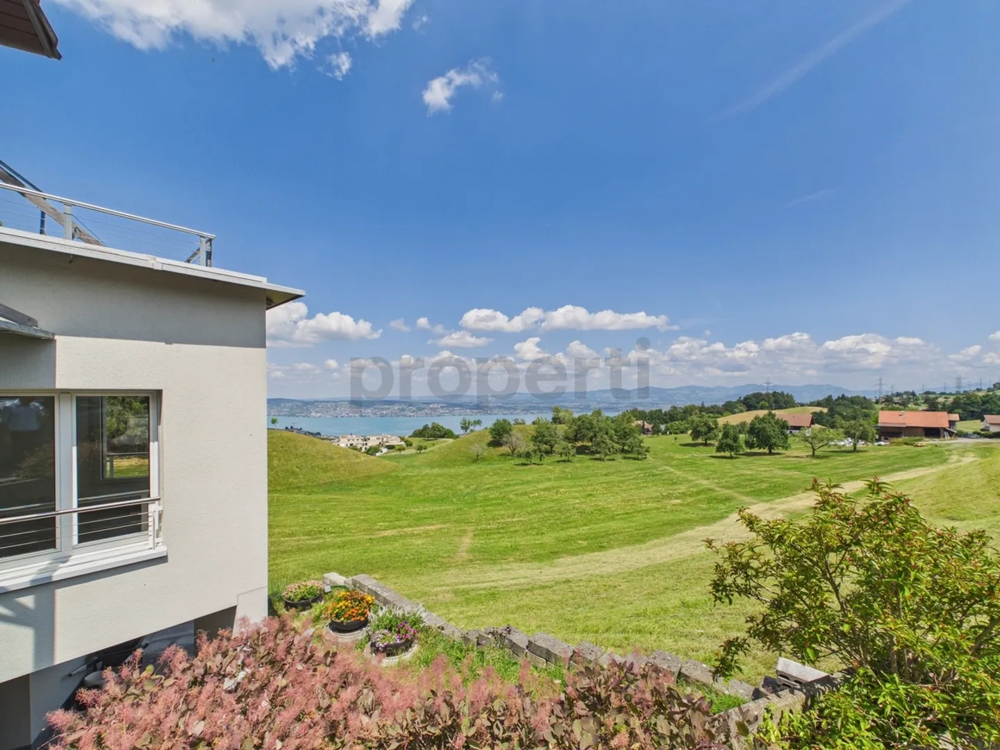 Hoch über dem Zürichsee mit unverbaubarem Seeblick - Foto 11 von 13