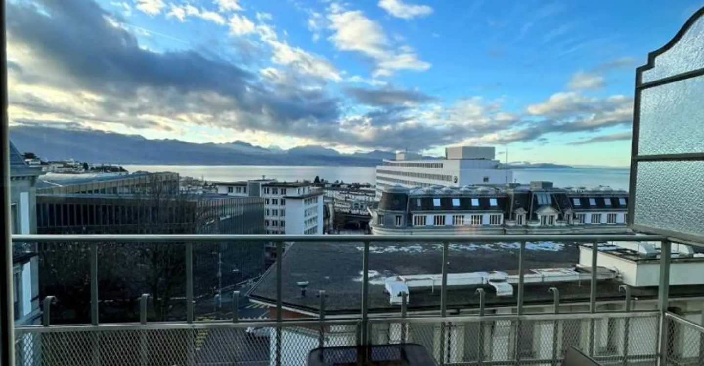 Appartement Charmant avec Vue sur le Lac - Photo 4 sur 7