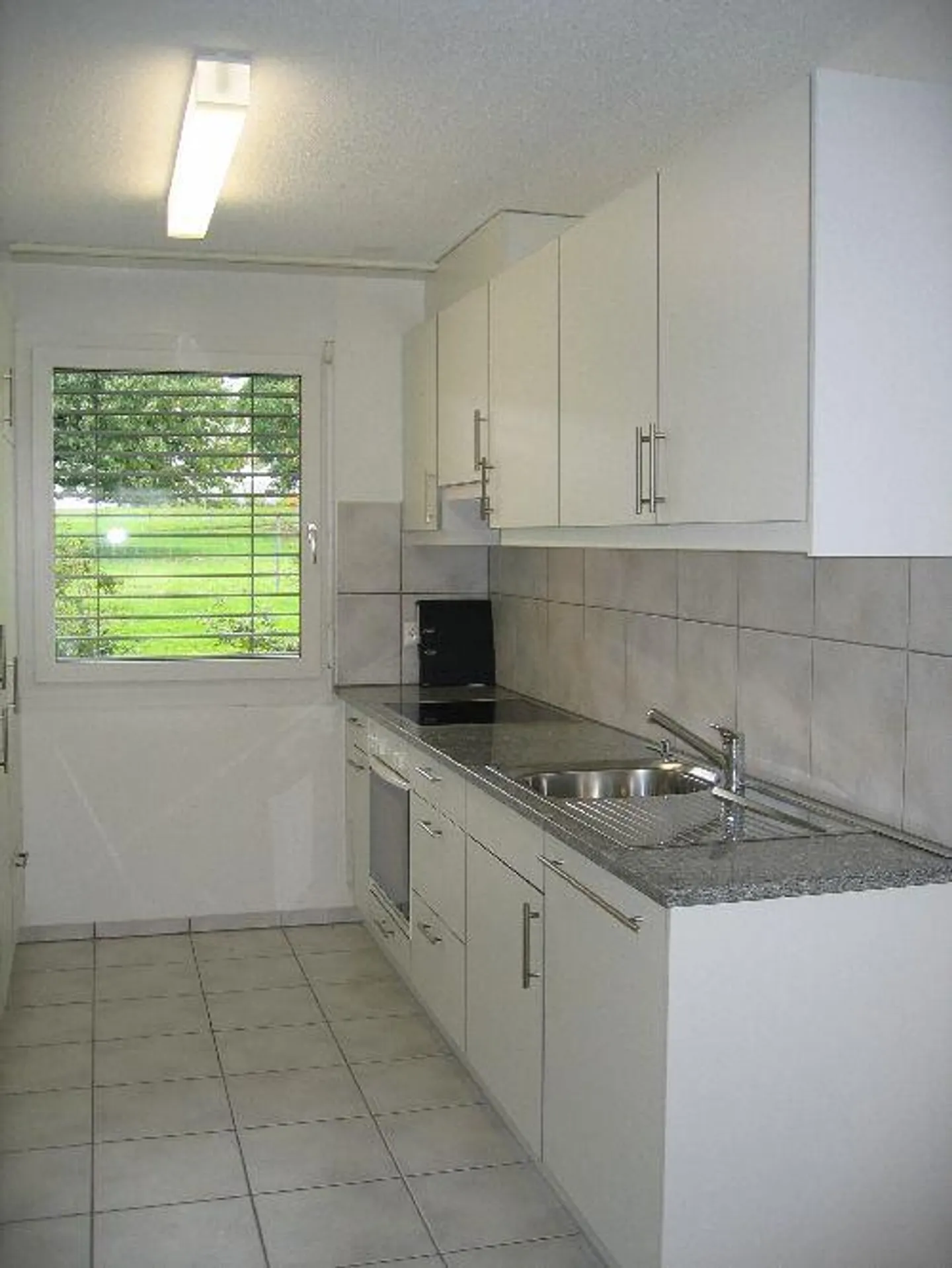 Grosszügige Wohnung mit Garten - Foto 3 von 6