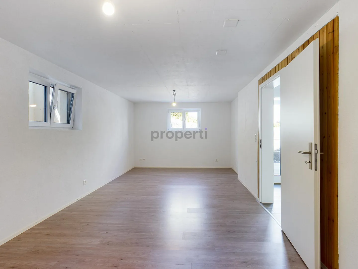 Appartement 2,5 pièces dans un quartier résidentiel calme avec terrasse privée - Photo 7 sur 8