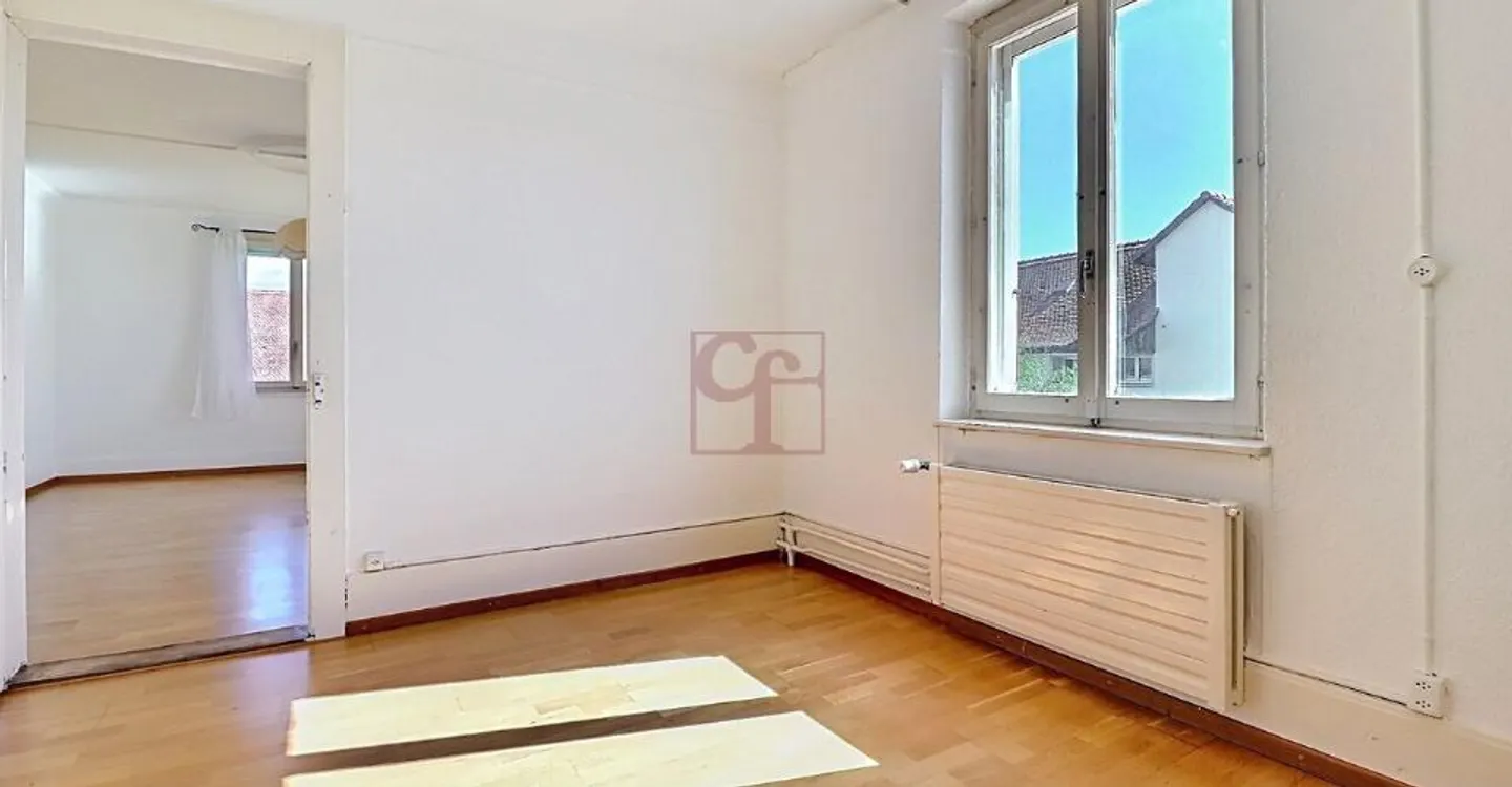 Maison familiale au cœur du village  composée de 2 appartements - Photo 10 of 13