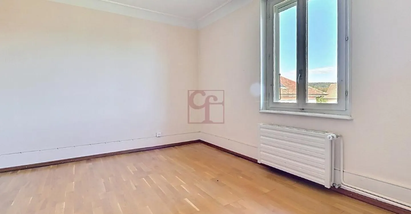 Maison familiale au cœur du village  composée de 2 appartements - Photo 12 of 13