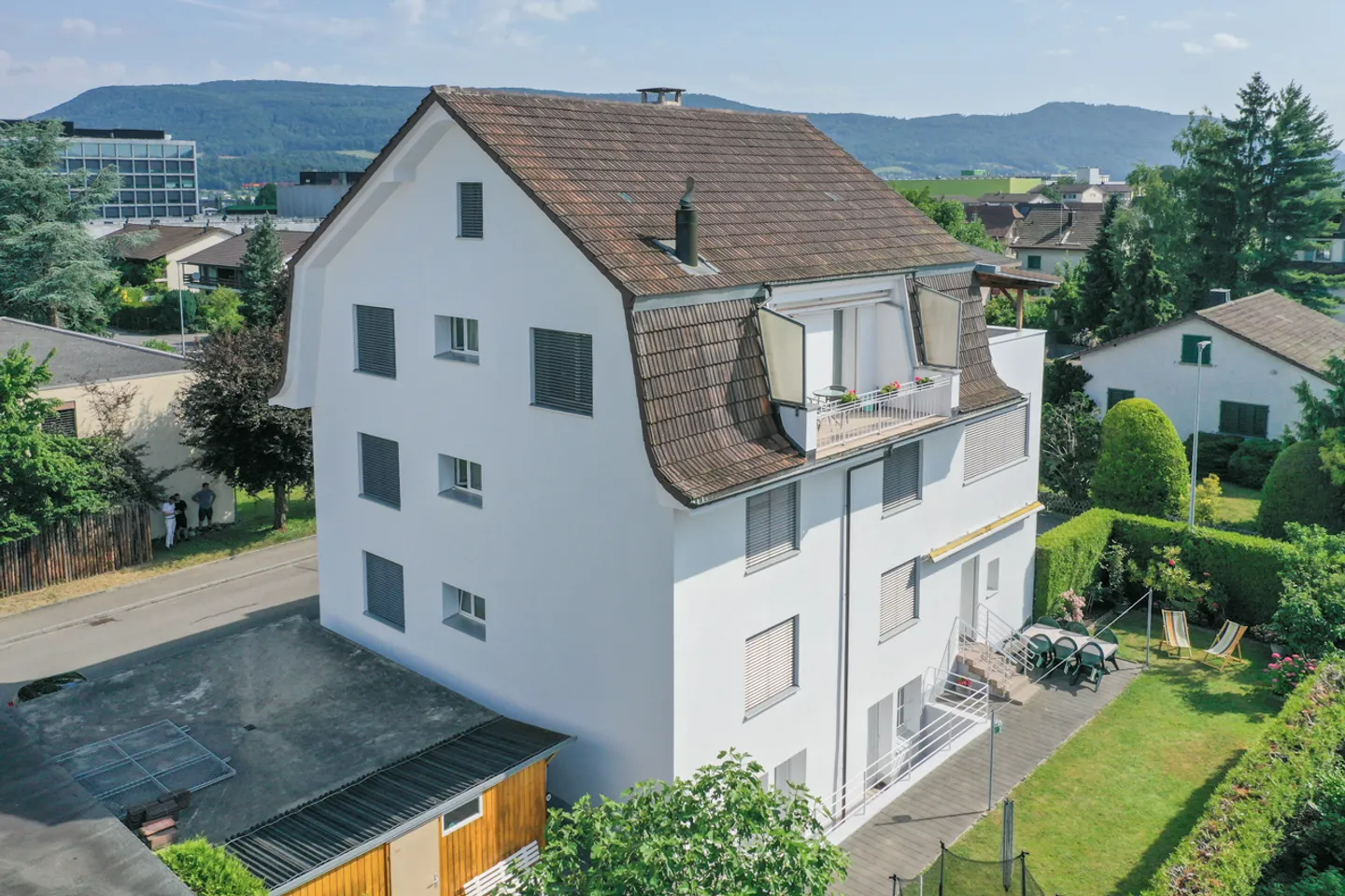 Completely Renovated Three-Family House in a Quiet yet Central Location - Photo 3 of 17