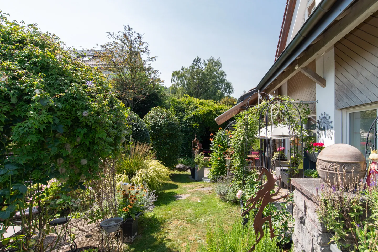 Gartenparadies trifft solide Baukunst – Ihr neues Zuhause! - Foto 12 von 13