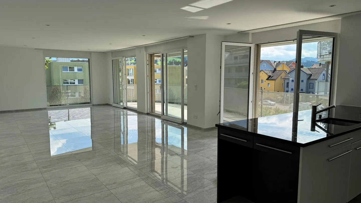 Appartement spacieux et moderne au centre de Gossau - Photo 1 sur 14