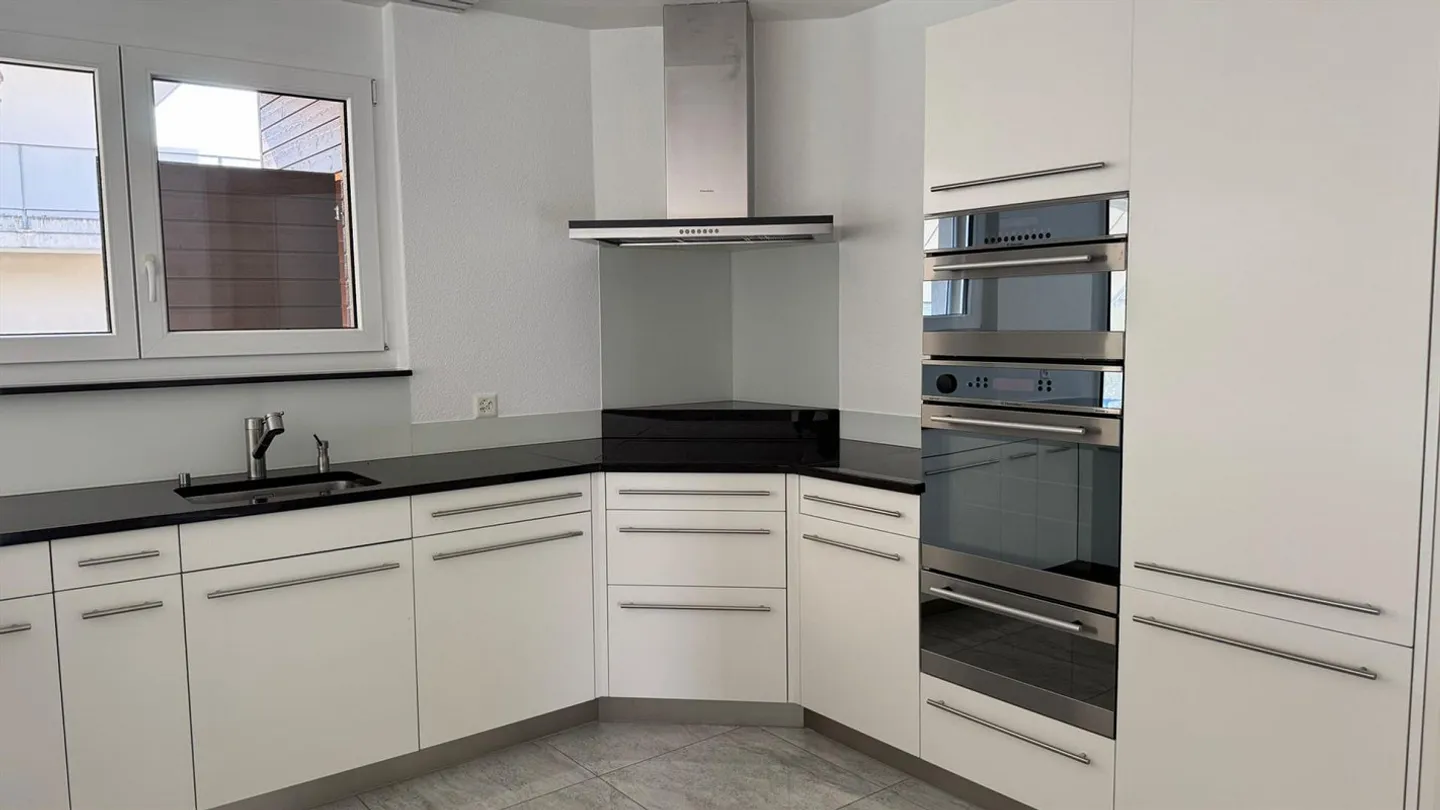 Appartement spacieux et moderne au centre de Gossau - Photo 5 sur 14