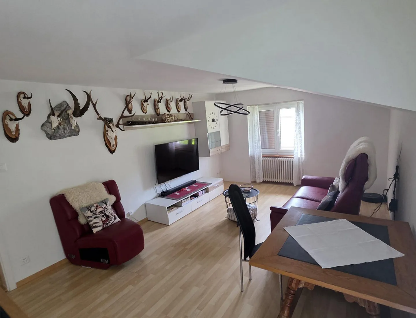 Charmante Dachwohnung - Foto 1 von 4