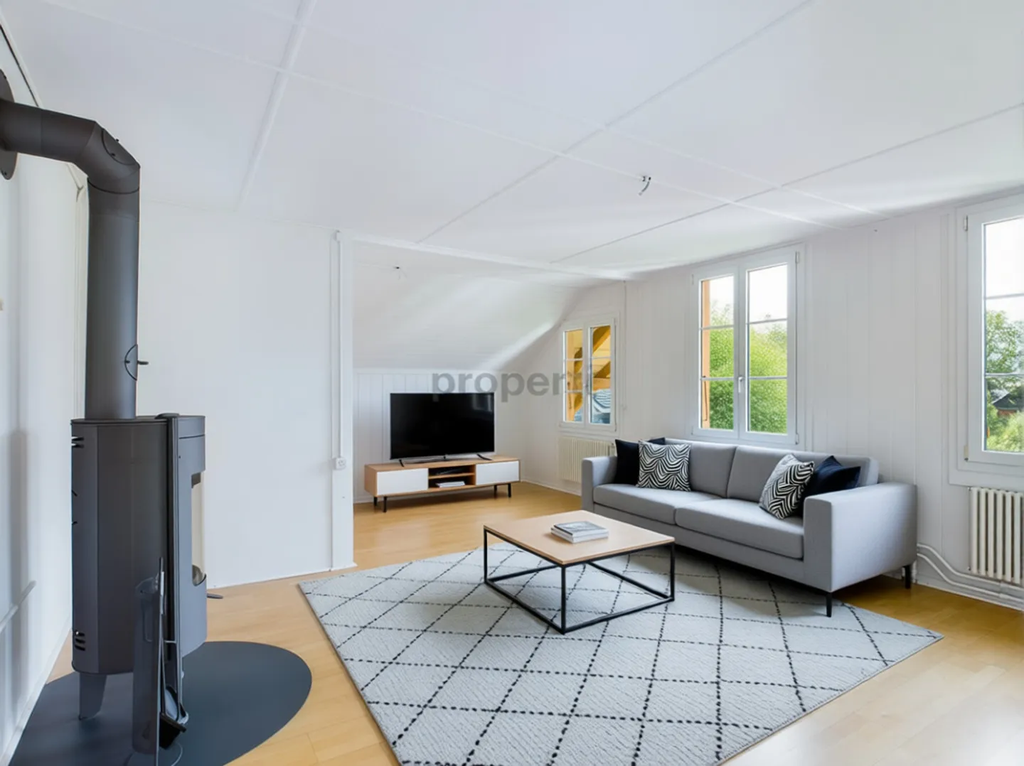 Charmante Dachwohnung in Thierachern - Foto 1 von 11