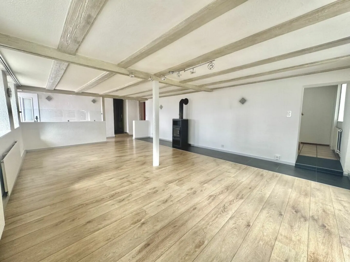 Exclusive Residential Idyl: Charming Farmhouse on Southern Slope with Great Potential in Oensingen - Photo 13 of 25