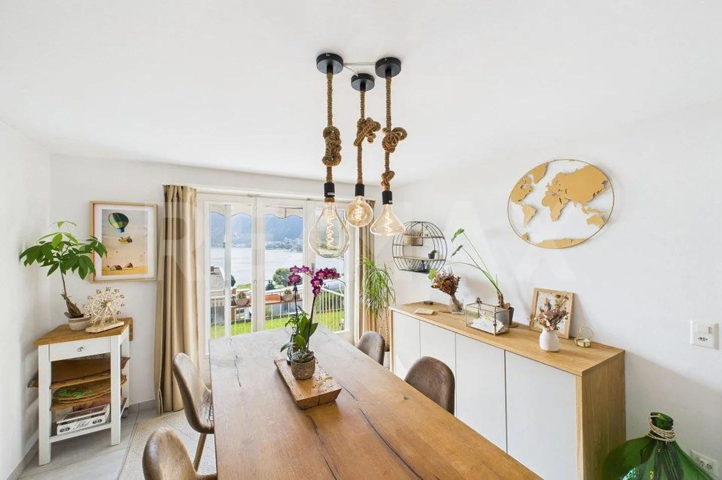 Appartamento con giardino e vista lago - Foto 1 di 10