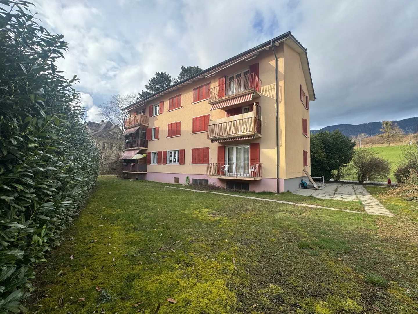 Well-maintained multi-family house with 6 residential units & 9 garages - Photo 2 of 13