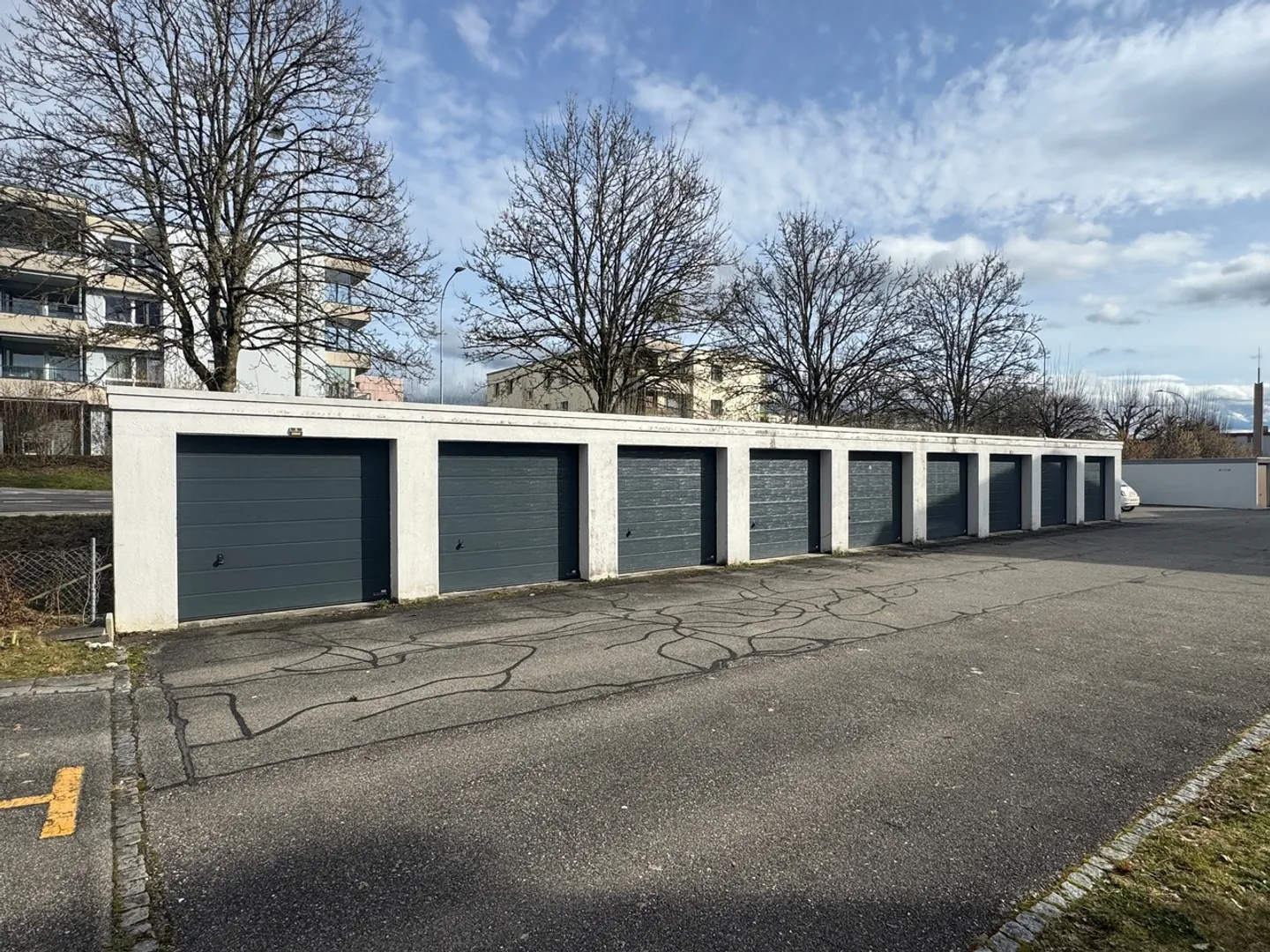 Well-maintained multi-family house with 6 residential units & 9 garages - Photo 4 of 13