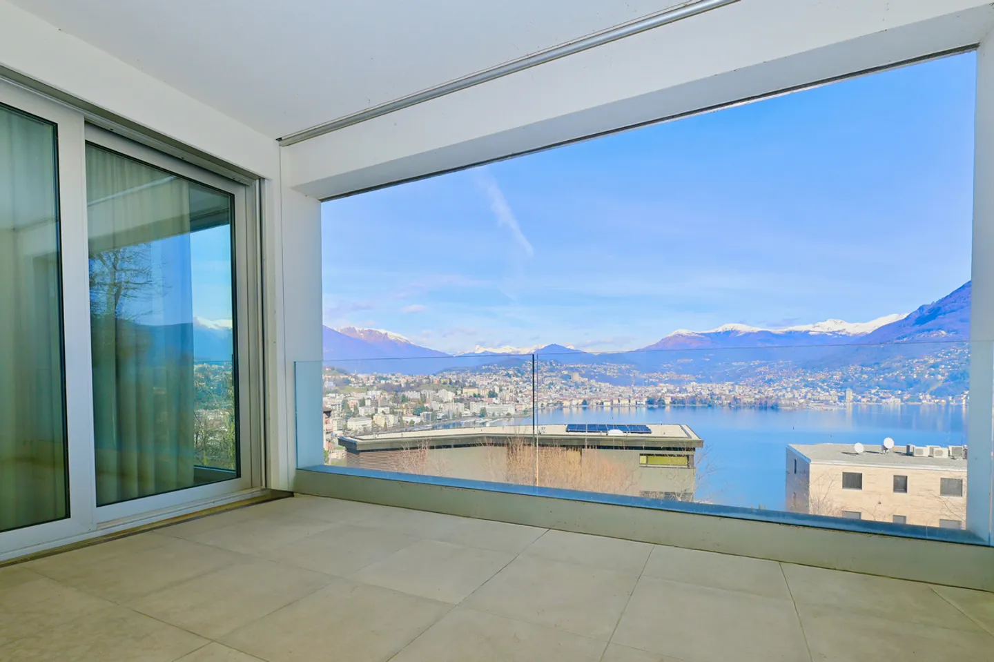 Modern Penthouse with Lake Lugano and Mountain View - Photo 5 of 16