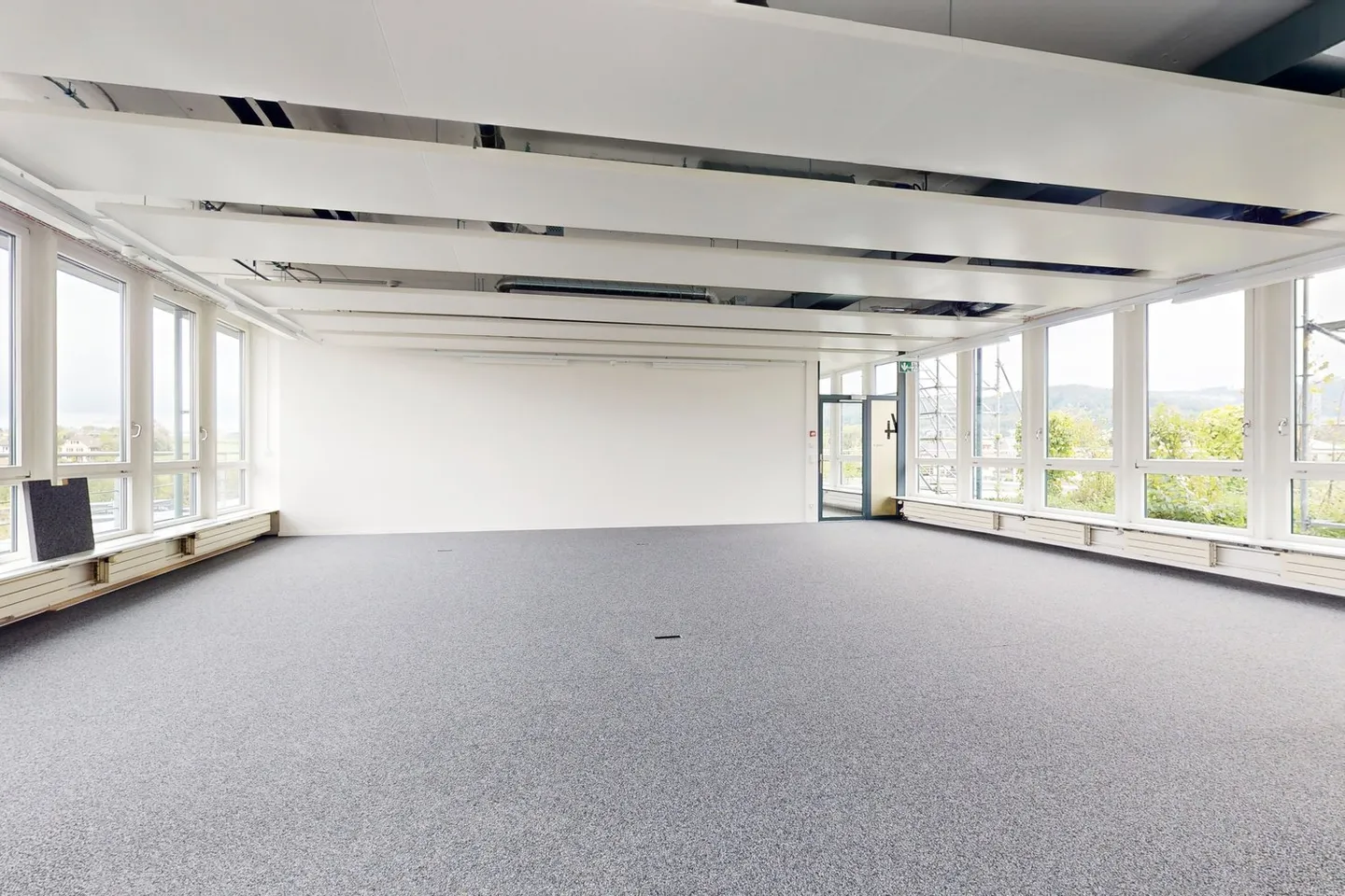 Freshly renovated office spaces with rooftop terrace, cooling ceilings, and great views! - Photo 7 of 11