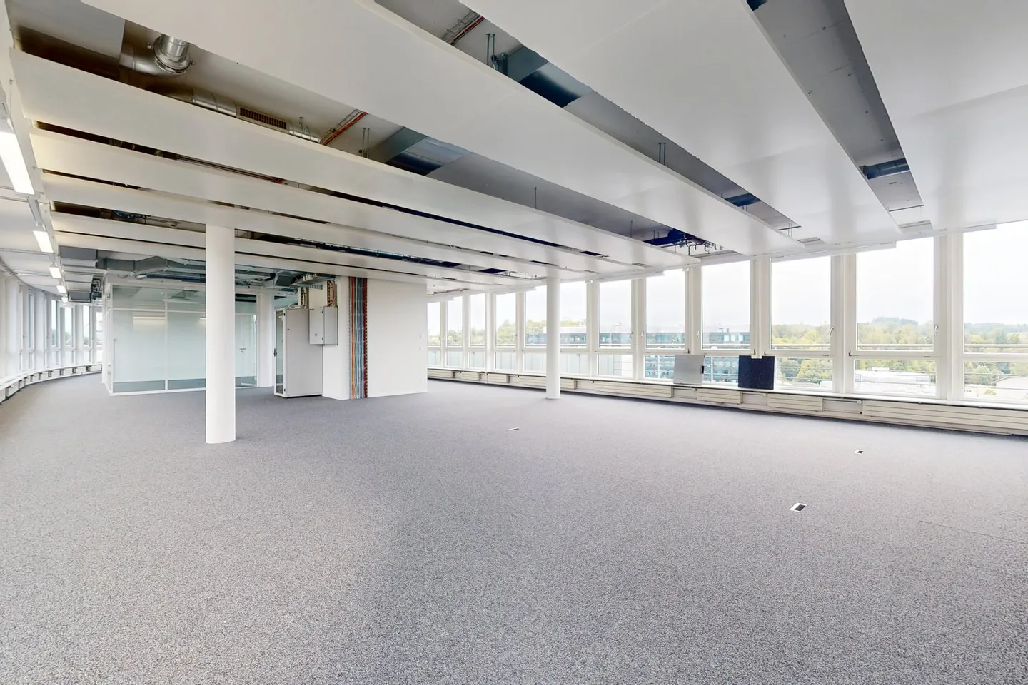 Freshly renovated office spaces with rooftop terrace, cooling ceilings, and great views! - Photo 8 of 11