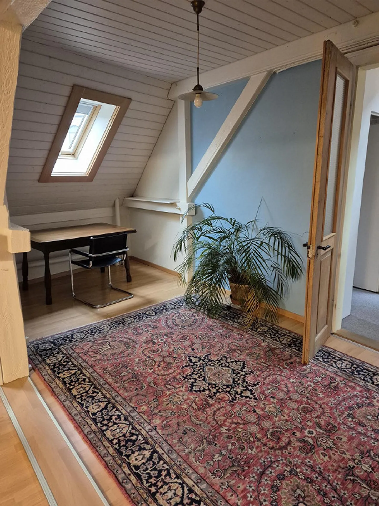 Charming 3.5-room attic apartment in the heart of St. Gallen's old town - Photo 5 of 12