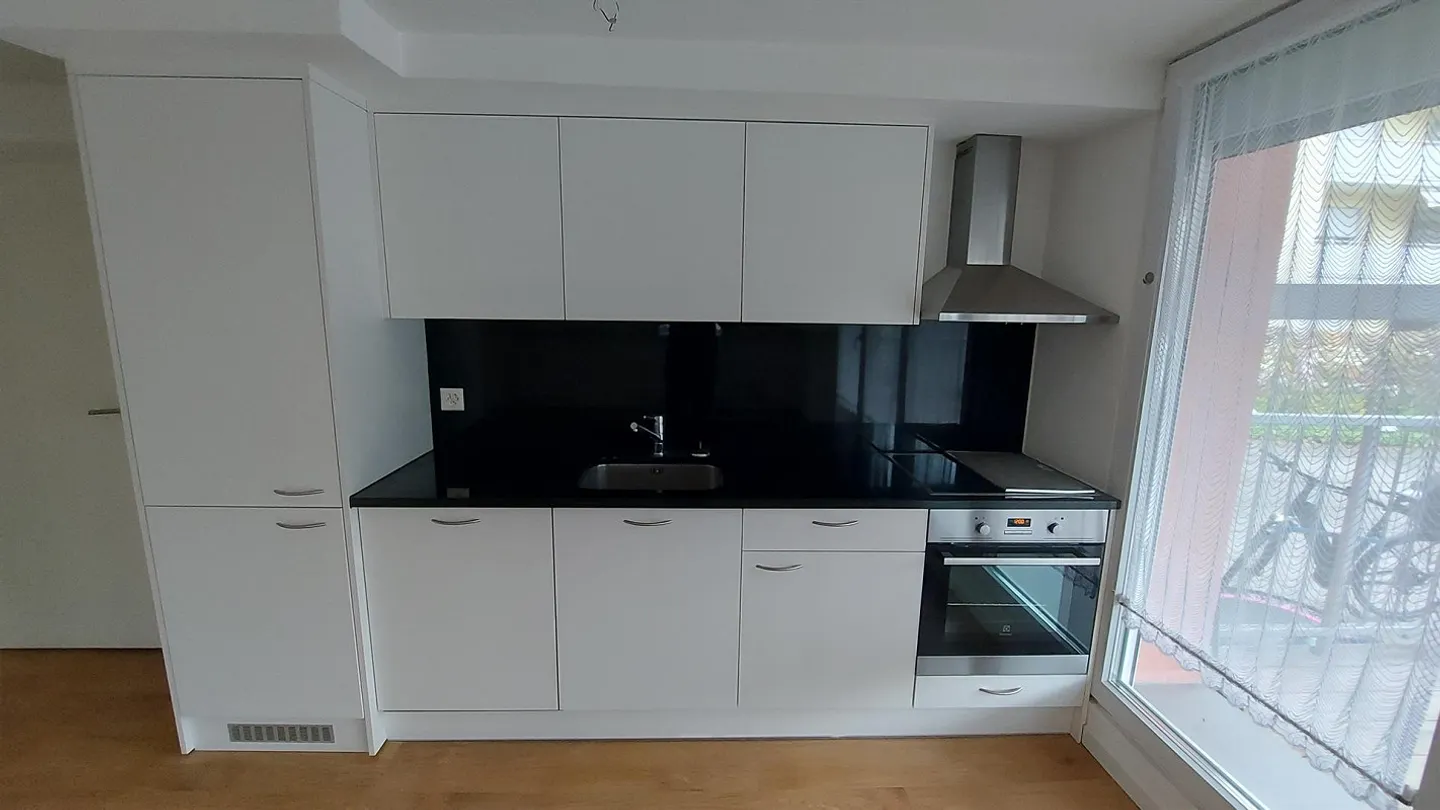 Appartement central 4.5 au rez-de-chaussée élevé - Photo 2 sur 18
