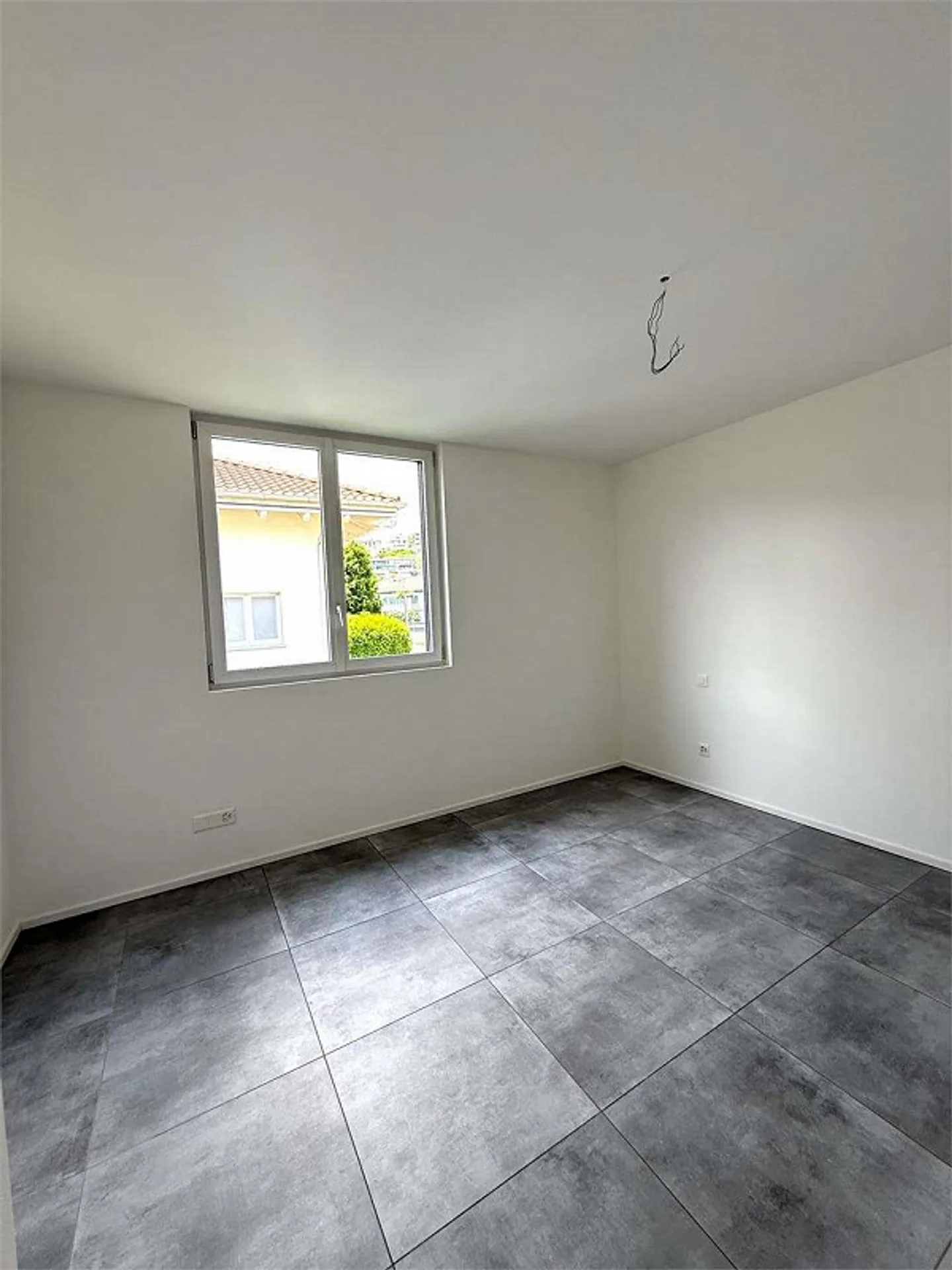 À Vacallo, dans un quartier résidentiel, appartement moderne de 2,5 pièces avec vue dégagée - Photo 3 sur 7