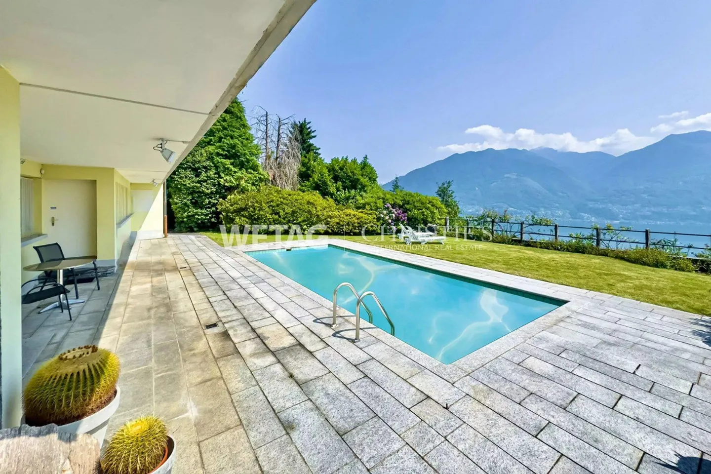 Minusio: Villa elegante con vista panoramica sul lago, piscina esterna &... - Foto 10 di 13