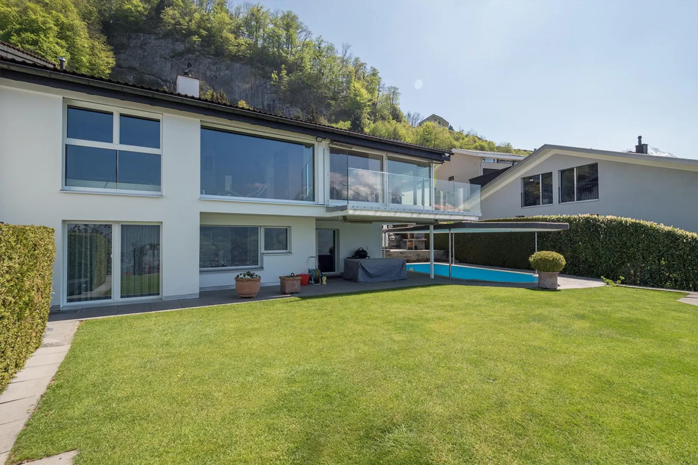 A house with covered outdoor pool - Photo 2 of 11