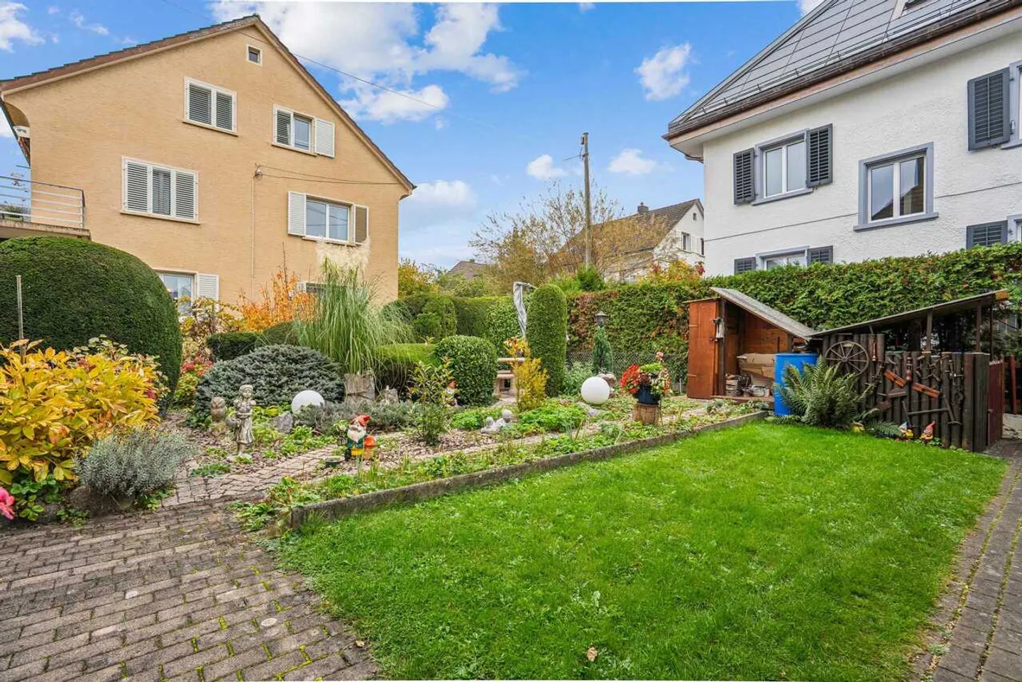Charming family house with comfort and well-kept garden in Wettingen - Photo 2 of 13