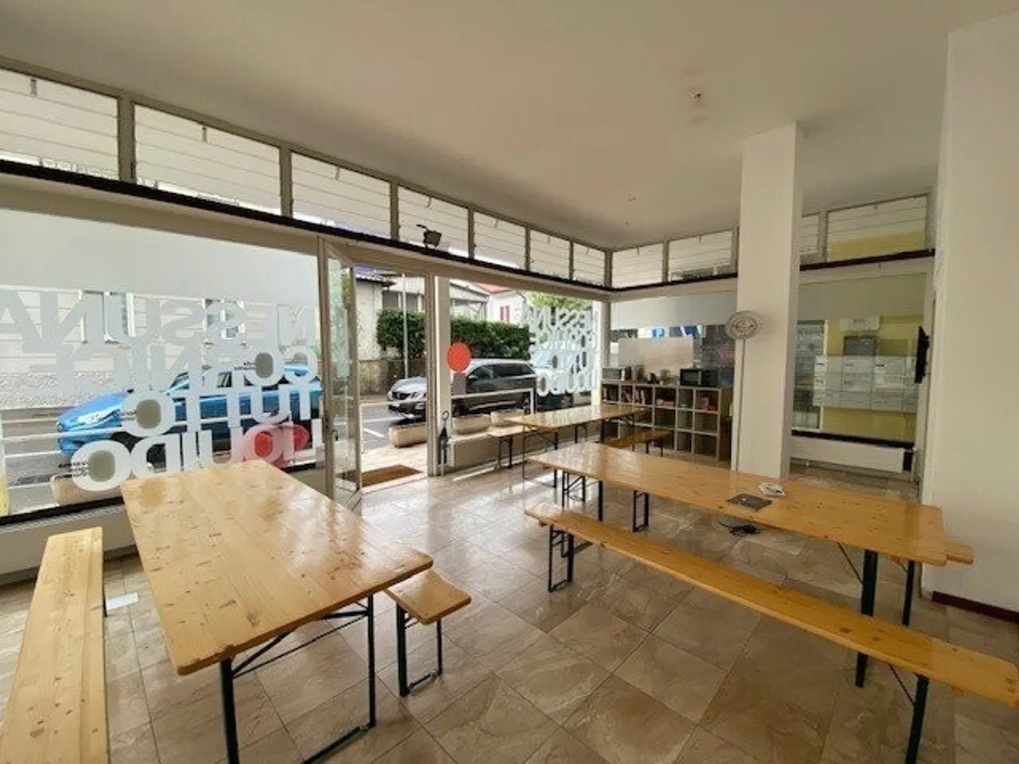 FOR RENT LARGE SHOP WITH WINDOWS - Photo 1 of 4