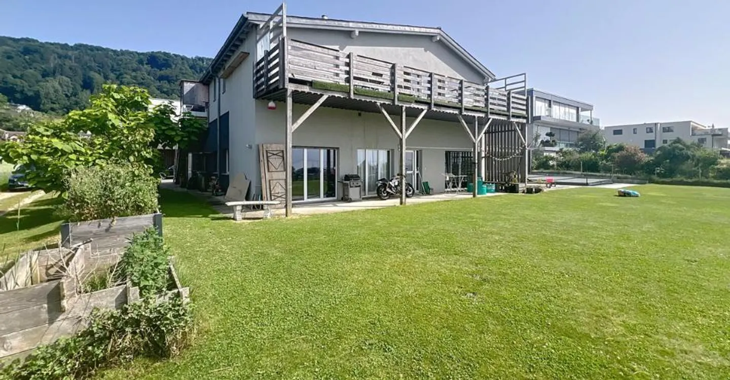 Vuoi un appartamento con giardino e vista sul lago? - Foto 1 di 5