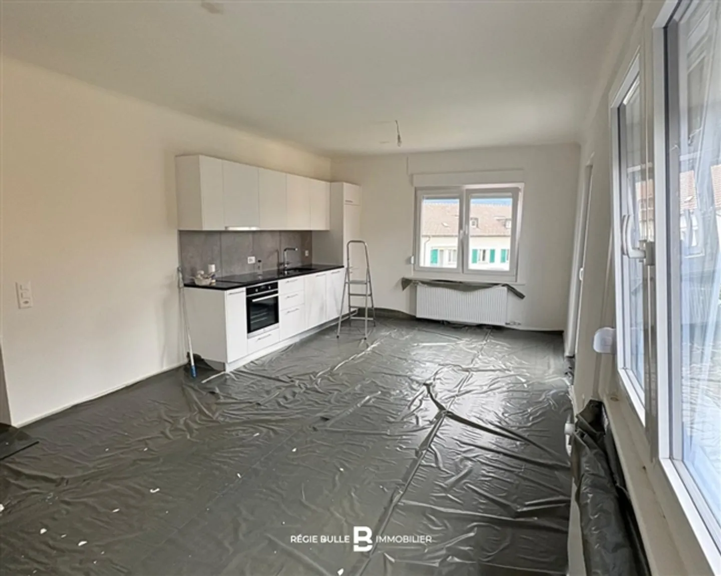 Appartement Charmant à Bulle - Photo 2 sur 4