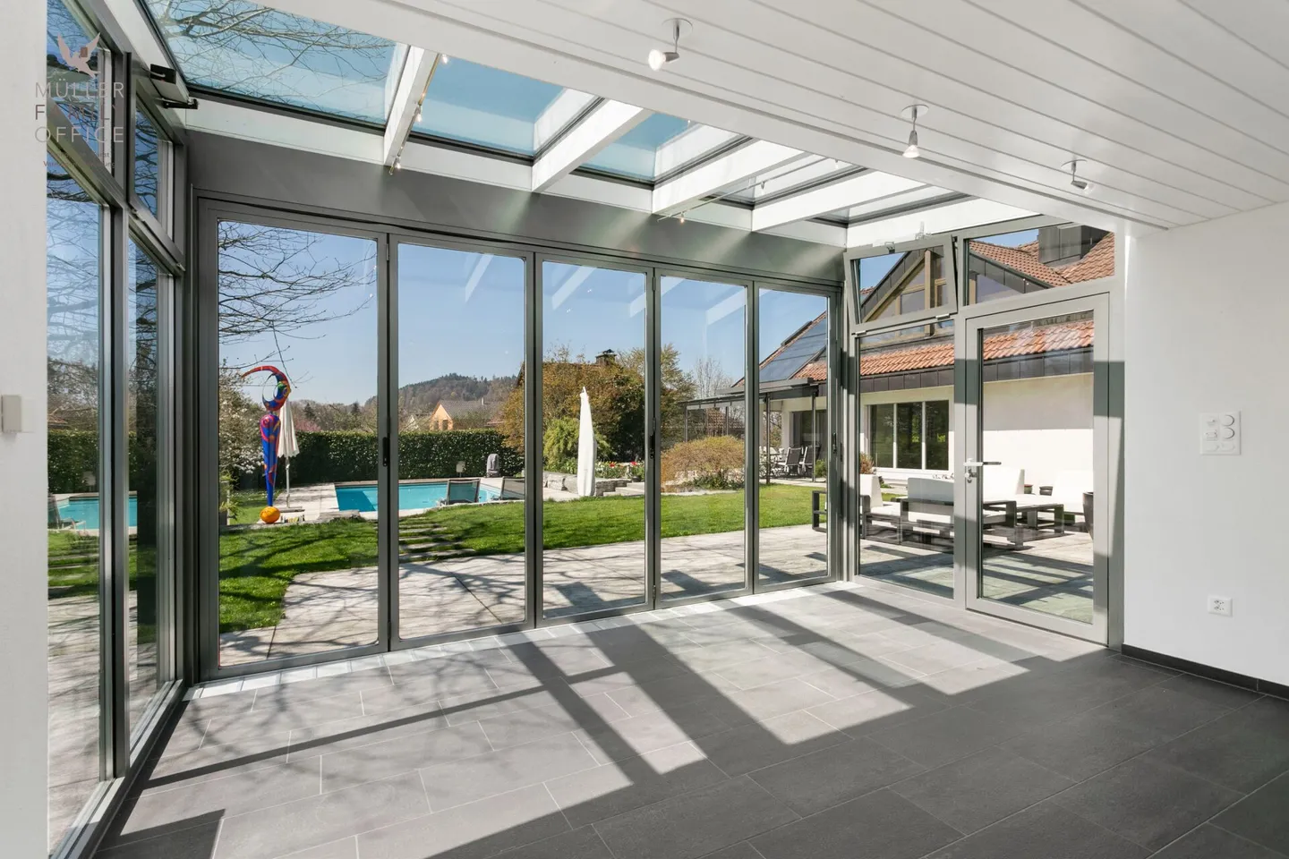 Elegant Single-Family Home with Dreamlike Garden and Pool Idyl - Photo 8 of 13