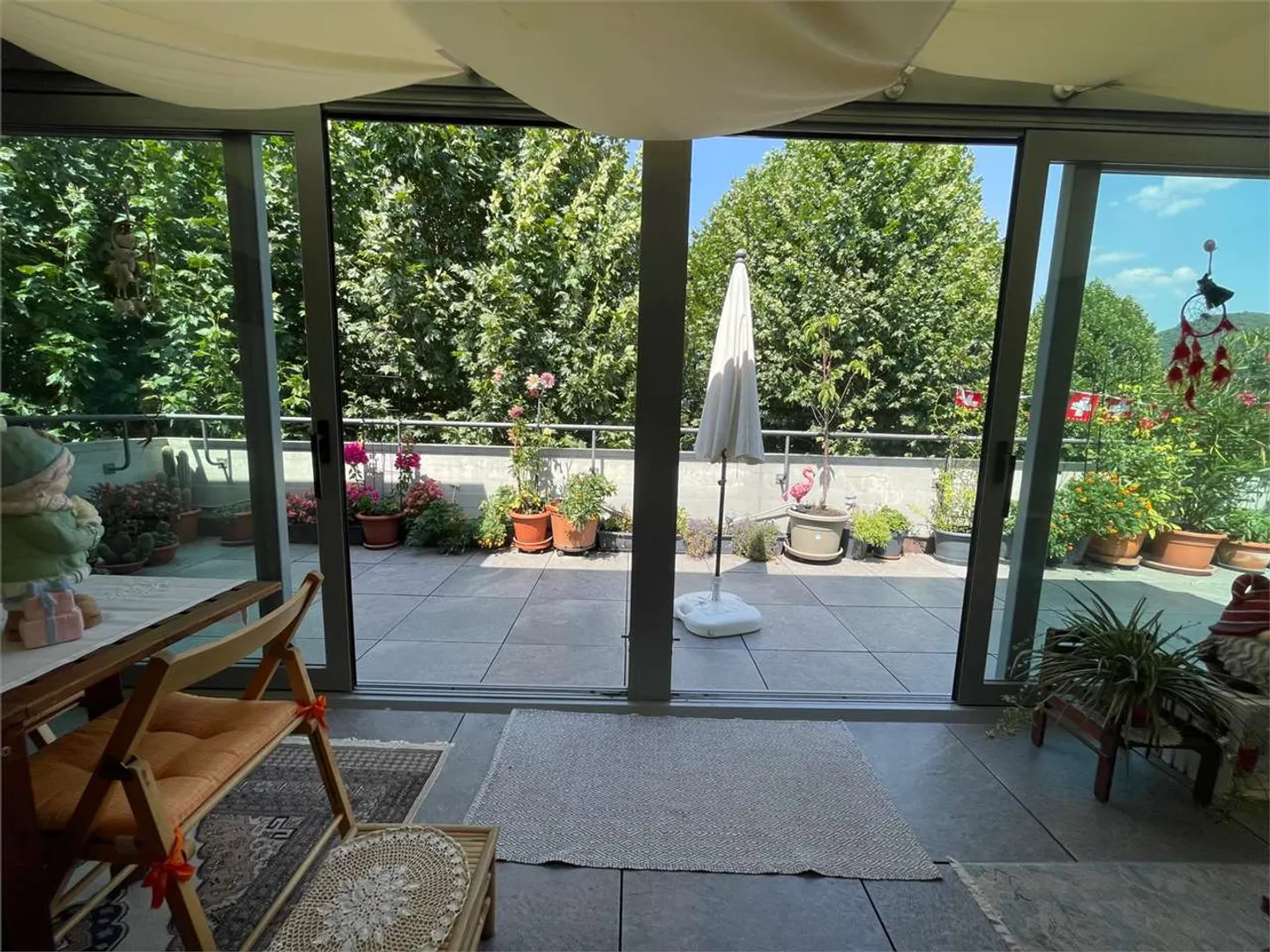 Elegant penthouse with 3.5 rooms, winter garden and terrace, Agno - Photo 4 of 13