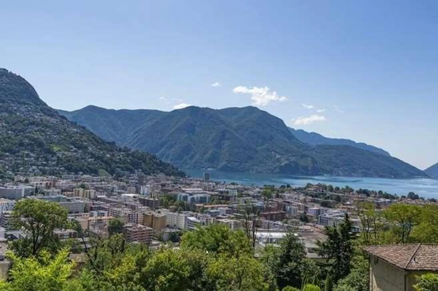 Attico moderno con grande terrazza panoramica e vista lago - Lugano - Foto 1 di 13