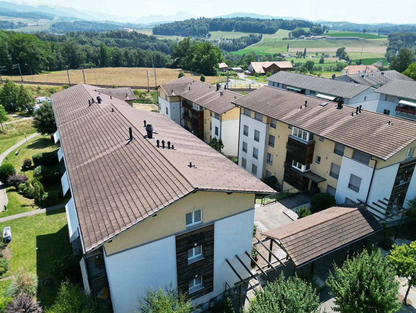 Appartement Charmant en Zone Verte - Photo 2 sur 4