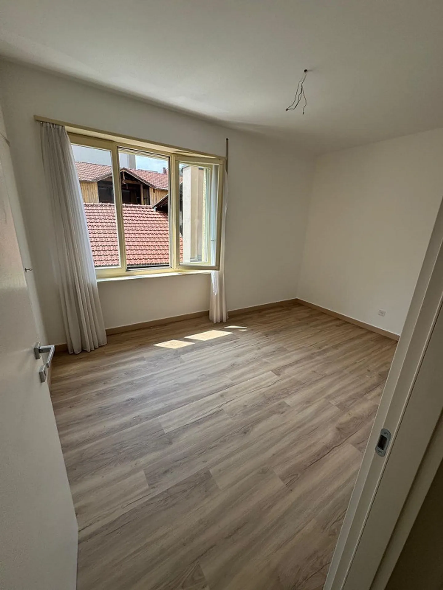 Komfortable 3,5 Zimmer in Cassarate - Foto 2 von 7